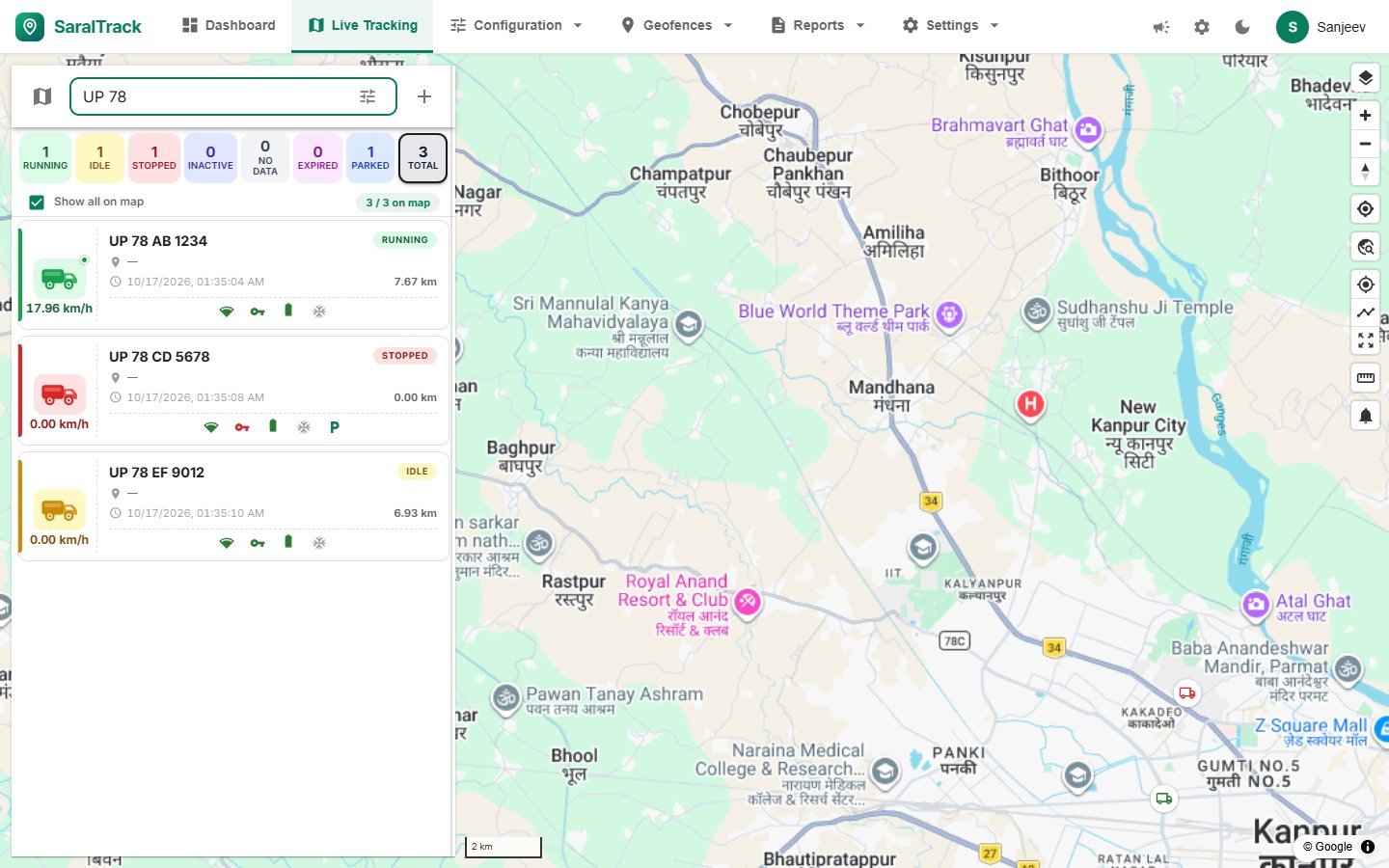 SaralTrack live tracking screen: vehicle list with status counts and a map of Kanpur